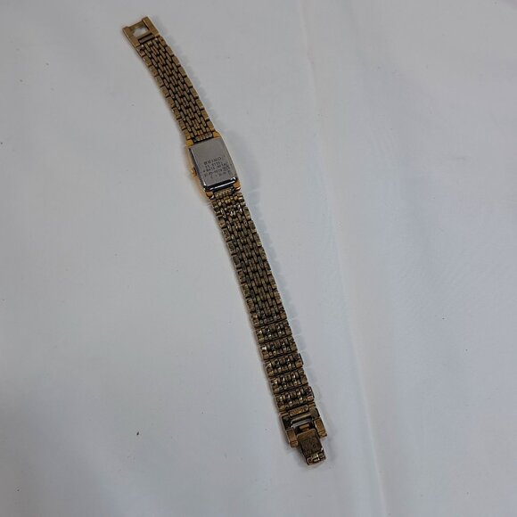 Vintage Seiko Watch Women Gold Tone Gold Dial Rectangle bracelet 2E20-7023 dress